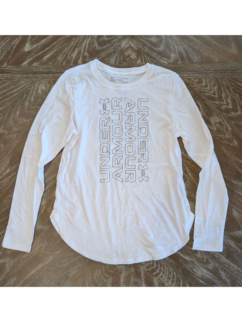 Under Armour Women's Vertical Logo Curved Hem Long Sleeve Shirt Medium